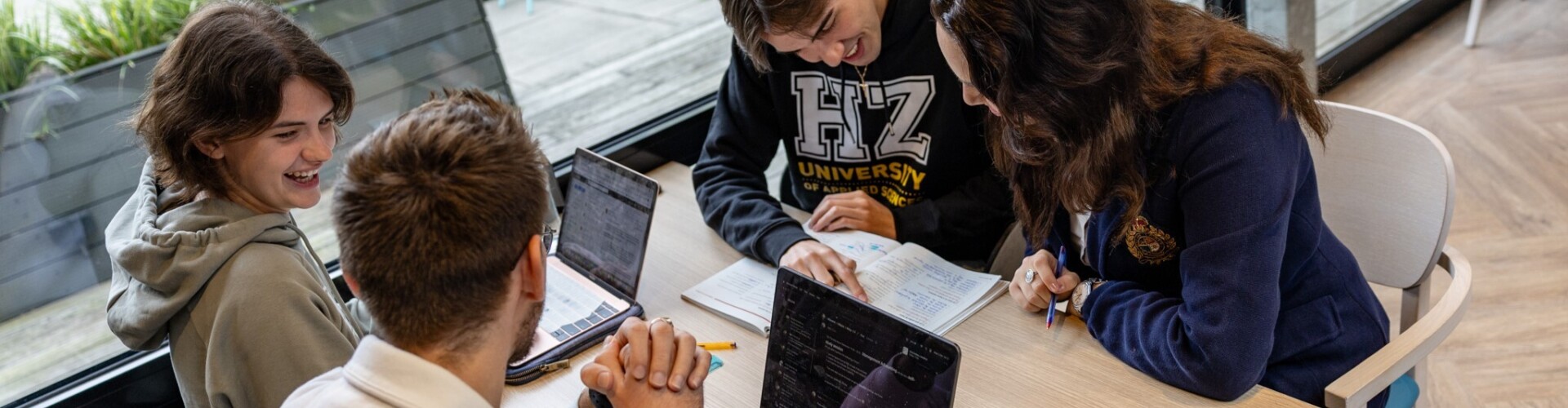 group of hz students studying together