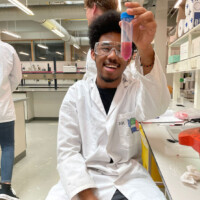Student AK is working in the chemistry lab