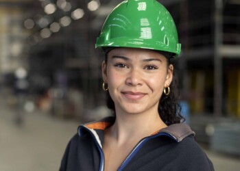 Industrial Engineering & Management student wearing a safety hat