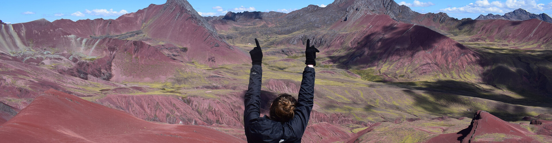 Student with a mountain range in the background