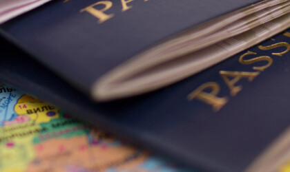 Close up of passports on a world map