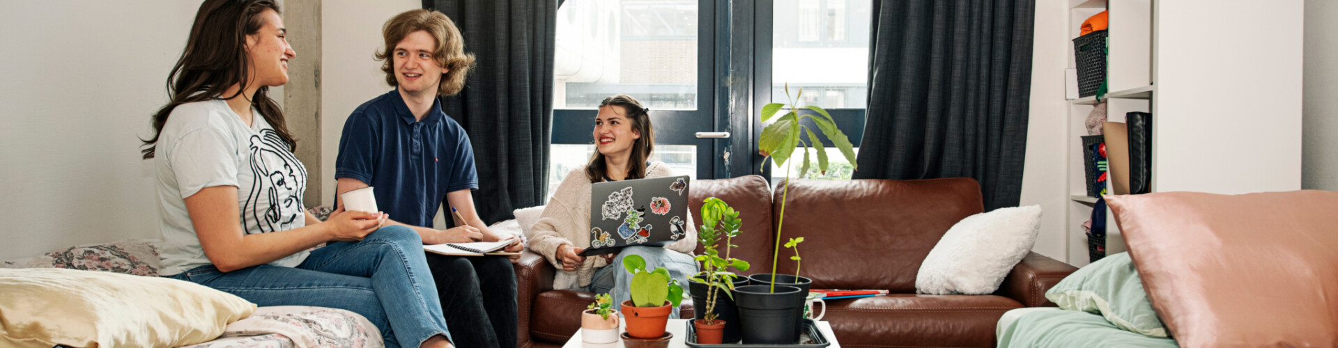 Students chatting together in their room