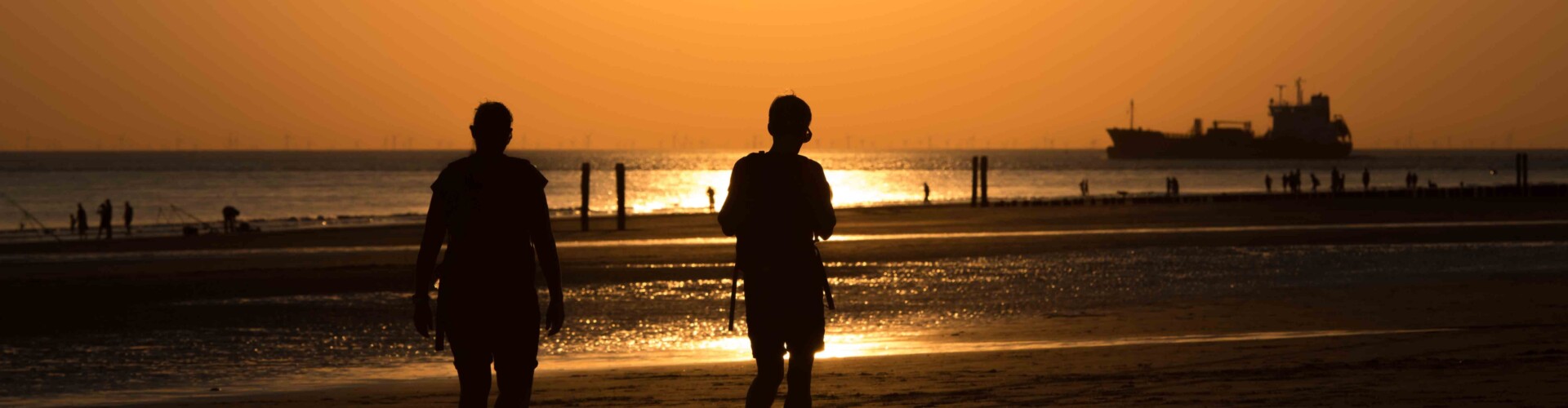 Zonsondergang Zeeland mensen