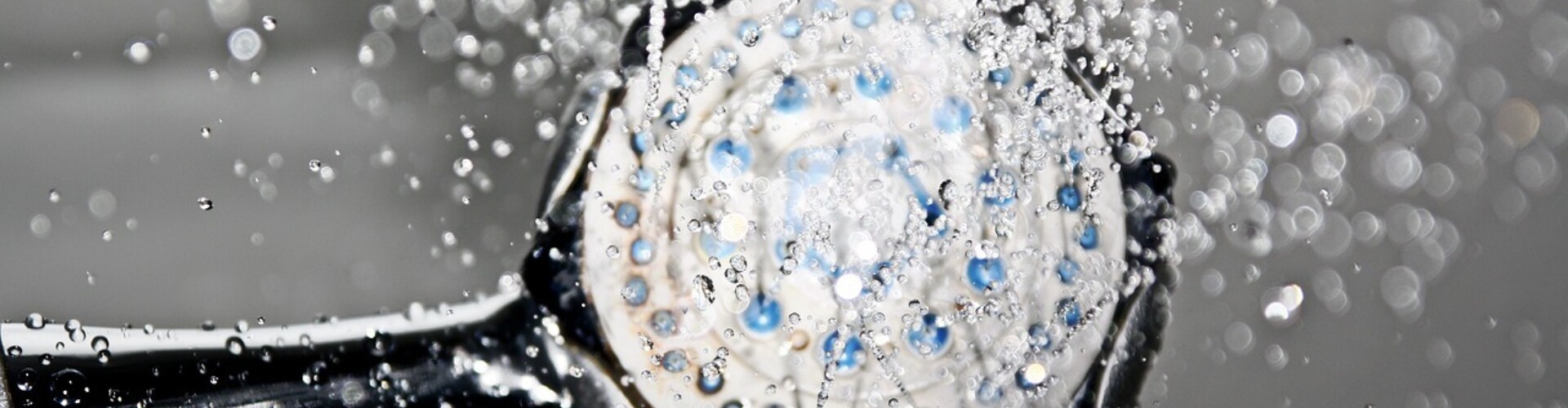 Shower head that has water spraying out of it