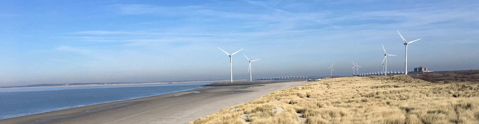 Windmills near a dune
