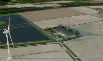 Farm with solar panels and wind turbines in the area