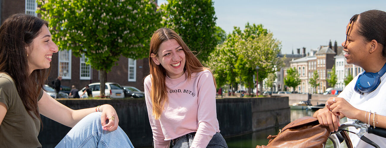 Students chatting in the city centre of Middelburg