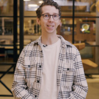 Jeffrey is standing in the HZ Café