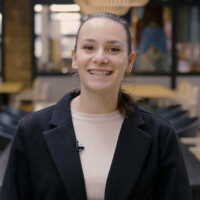 Siyana is standing in the HZ Café