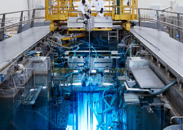 Two people working in a nuclear powerplant