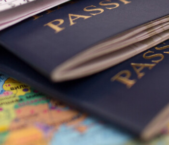 Close up of passports on a world map