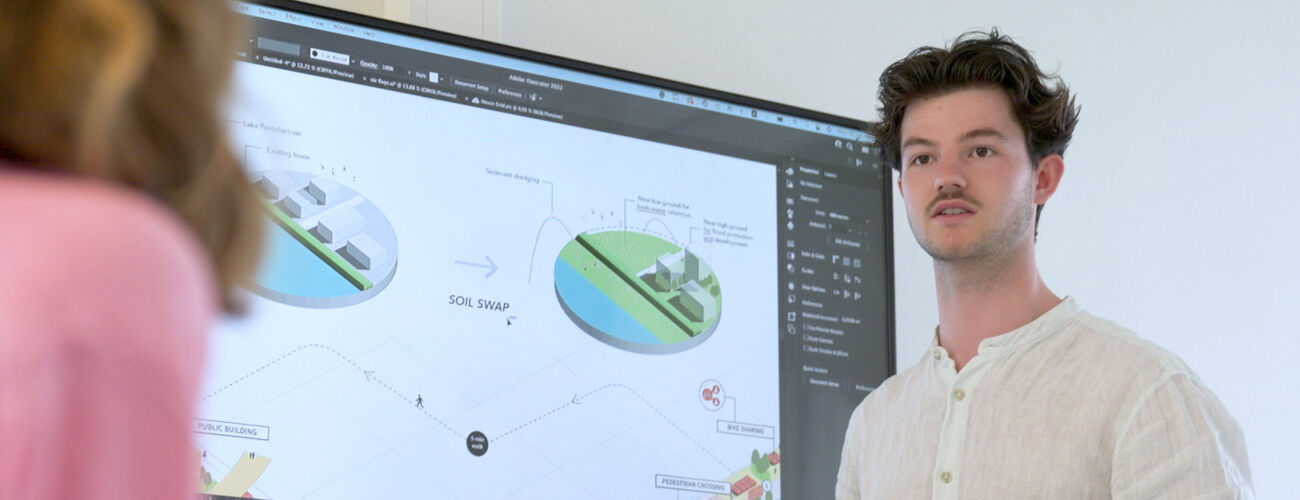An international student is presenting in class for his fellow students