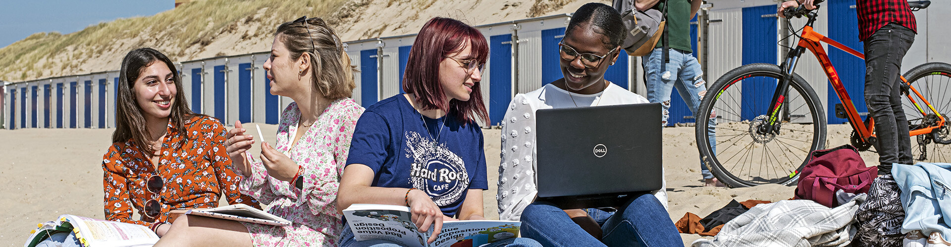 A group of students, who study abroad at HZ University of Applied Sciences in the Netherlands, studying at the beach in Vlissingen, Zeeland.