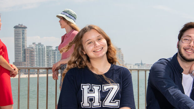 A group of international students with different backgrounds enjoying themselves at the seaside in Zeeland, The Netherlands.